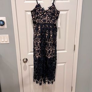Brand new with tags Aqua Navy lace print dress